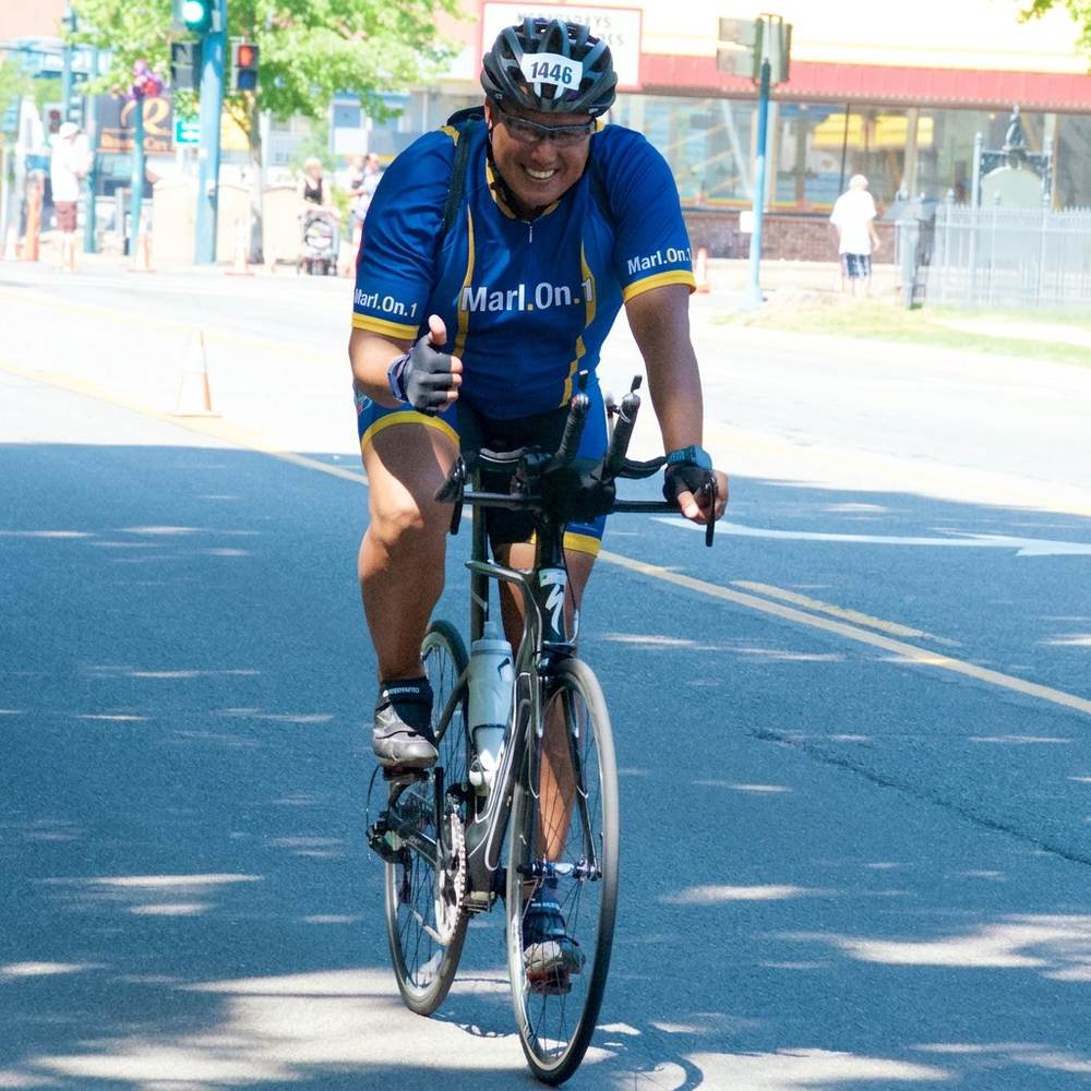 Coach Marlon with CHLA triathlon team on beach