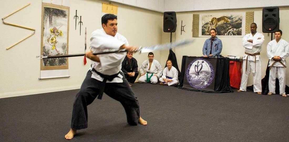 Marlon performing Kwan Dao weapon form